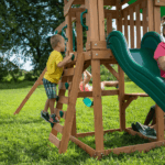 Canyon Creek All Cedar Swing Set Playset w/ Rockwall Upper Fort Belt Swings Web Swing Gray Wave Slide, and Play Kitchen - Image 6